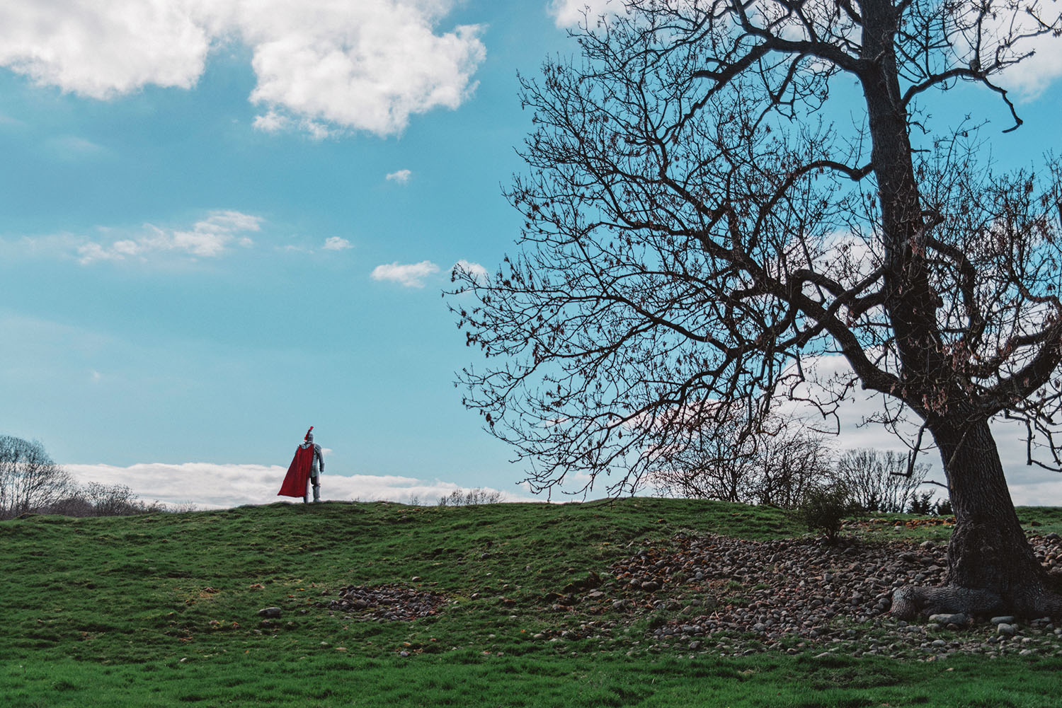 Man in King Arthur costume standing in British landscape - Lake District Tour in Cumbria - Lakes and Legends