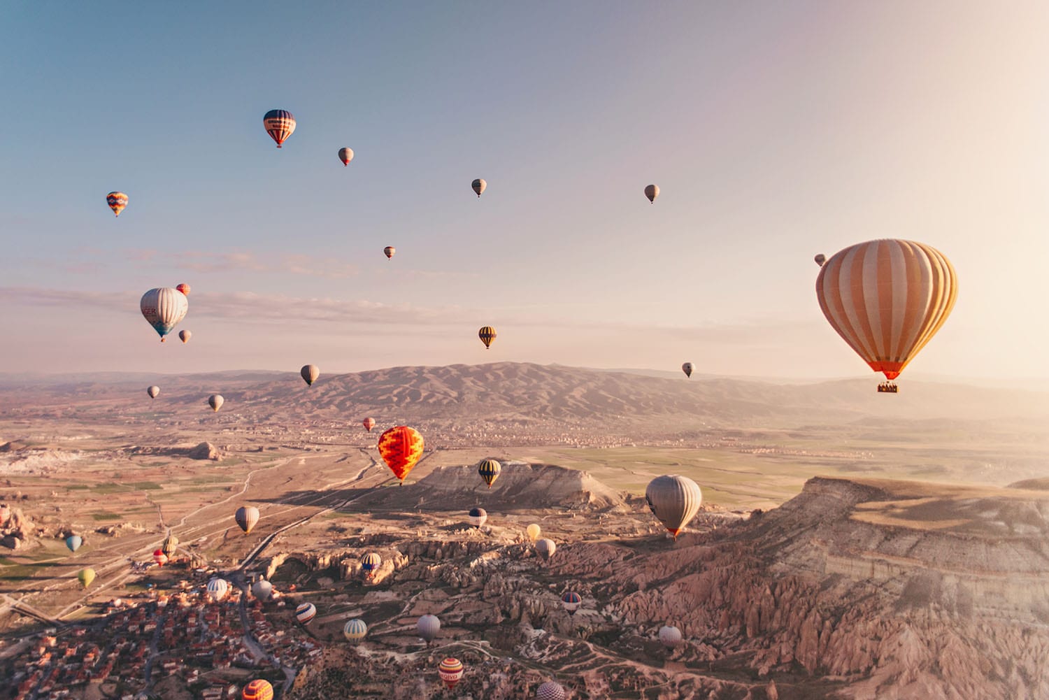 Beautiful sunrise with hot air balloons in Cappadocia, Turkey