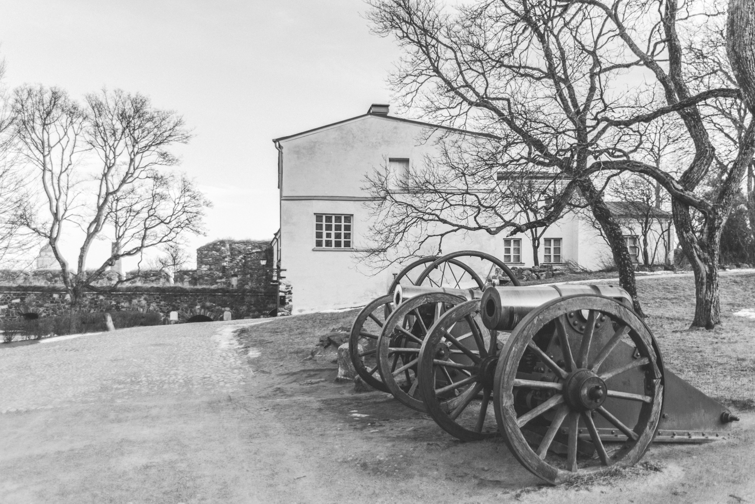 Black and white picture of cannons at Suomenlinna Island in Helsinki