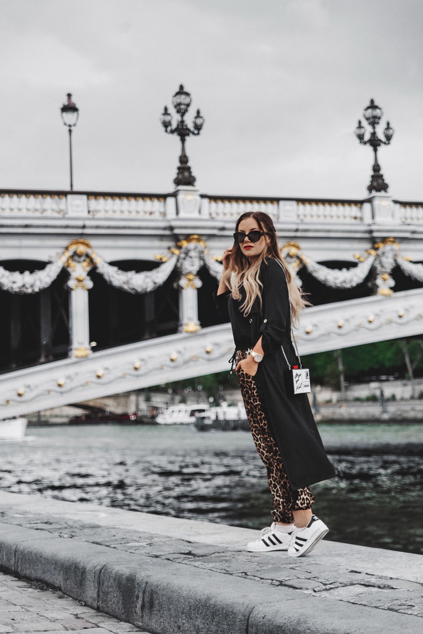 Travel in Style Outfit Idea with Leopard Pants, Black Cardigan & Karl Lagerfeld Clutch