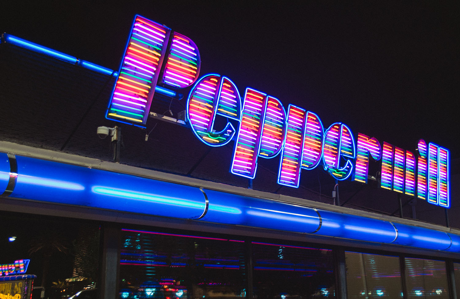 Neon sign outside The Peppermill Restaurant & Fireside Lounge