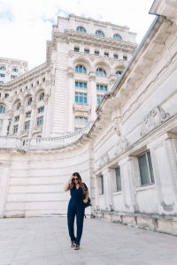 Standing in front of Palace of Parliament, Bucharest, Romania