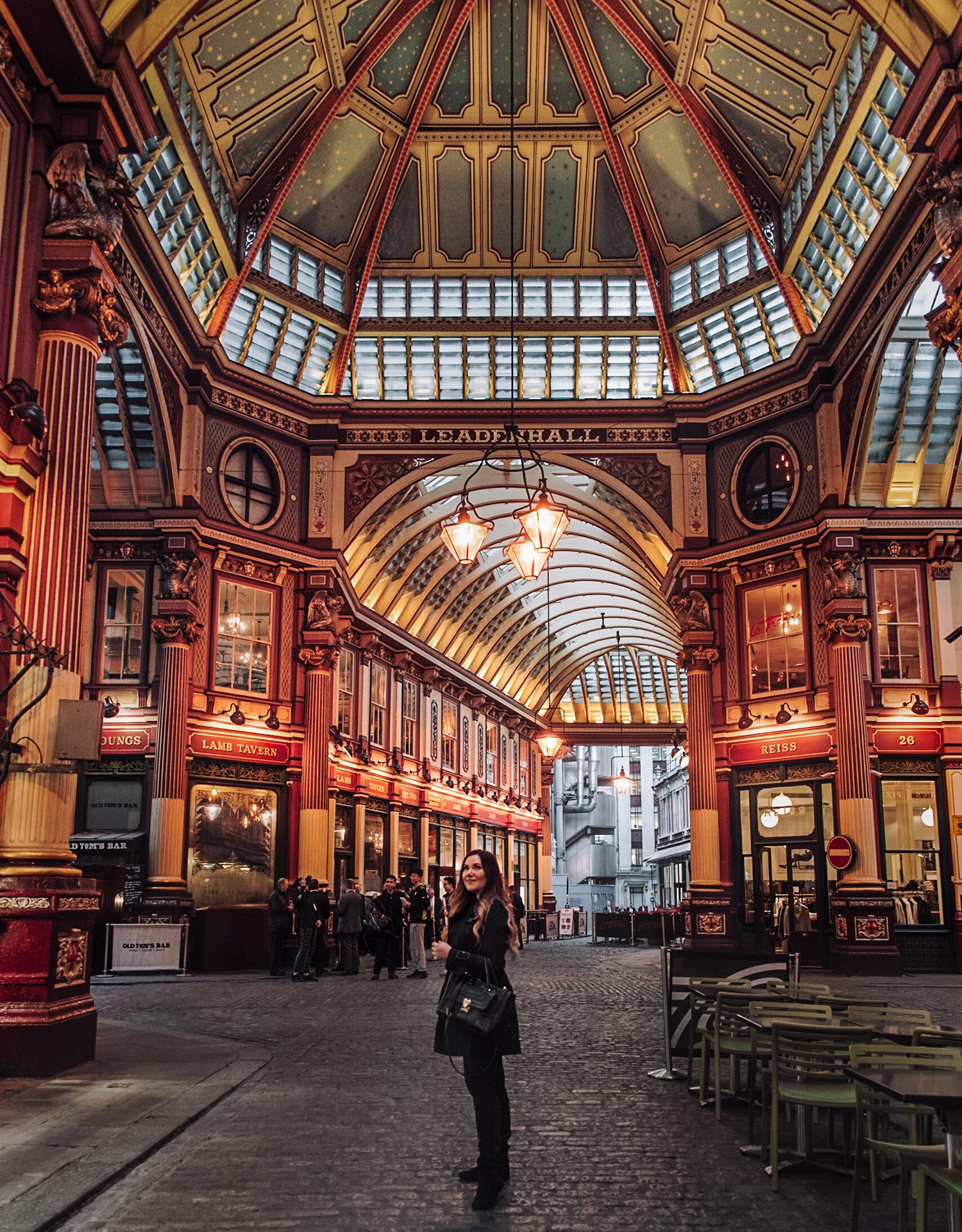 Girl standing in Leadenhall Market in London