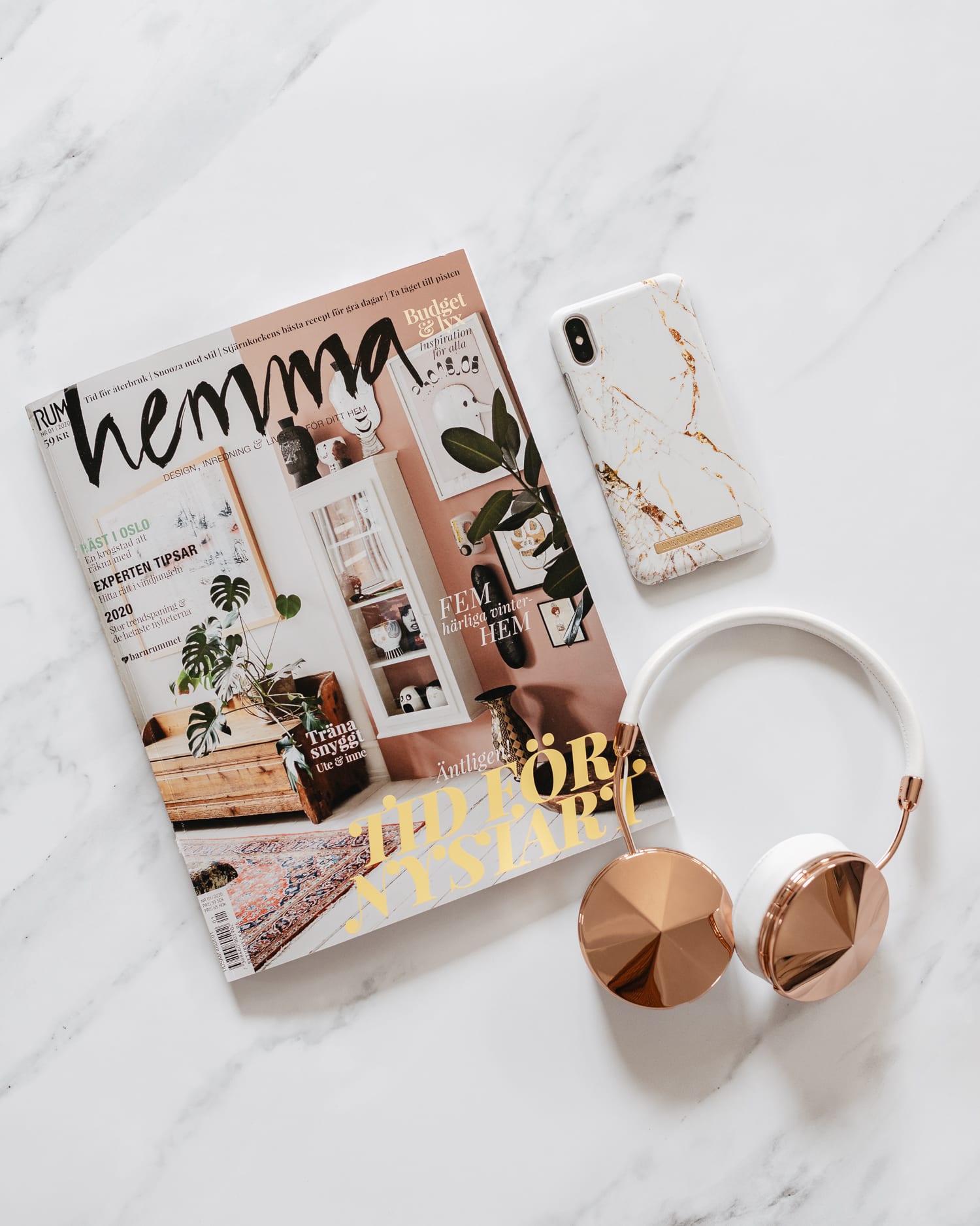 Flatlay with Frends Wireless Headphones & Ideal of Sweden Case