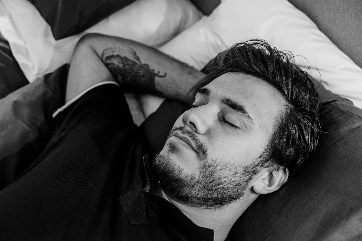 Man Sleeping in Bed - Black and White Photo