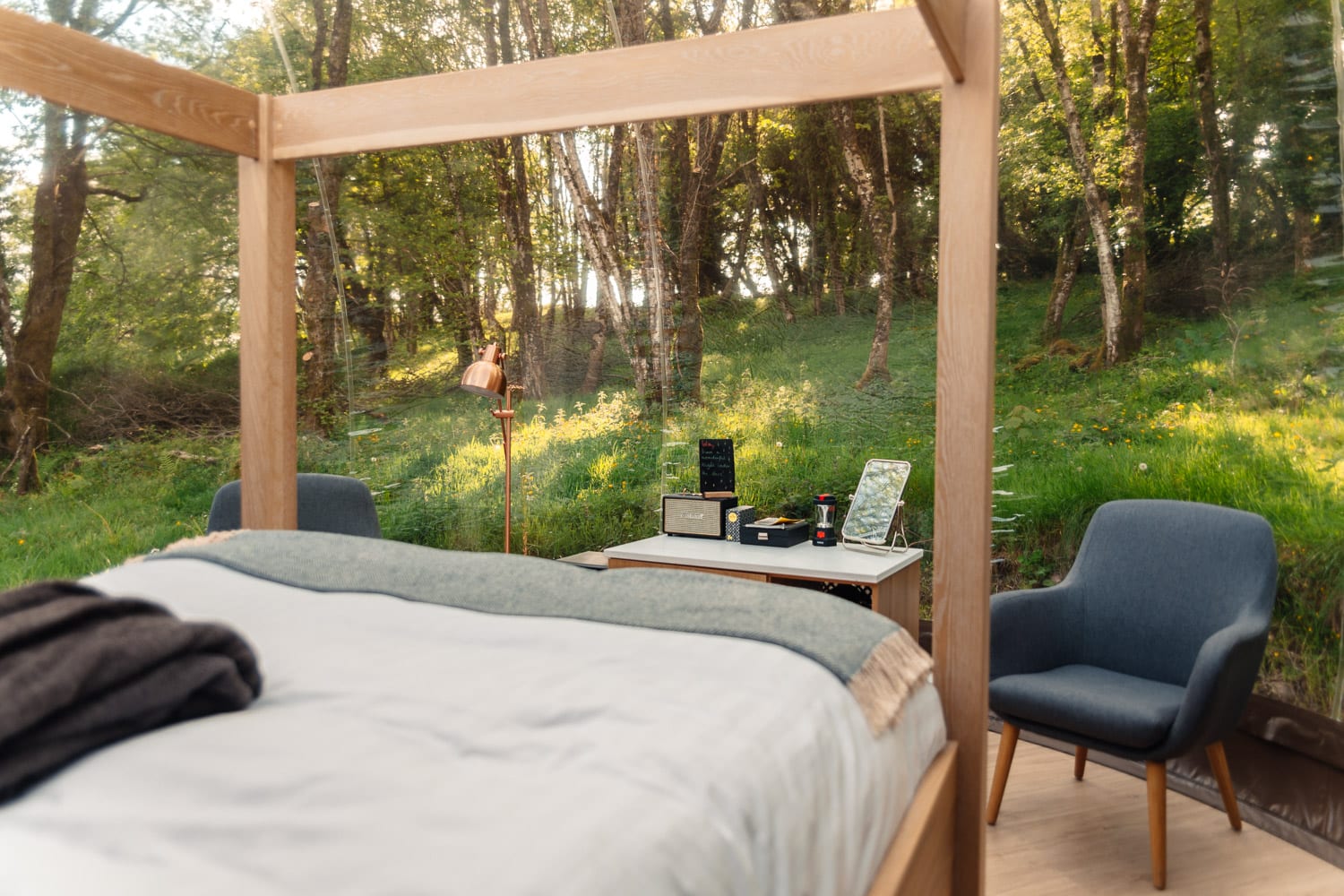 Four-poster bed in Finn Lough Resort's Bubble Dome
