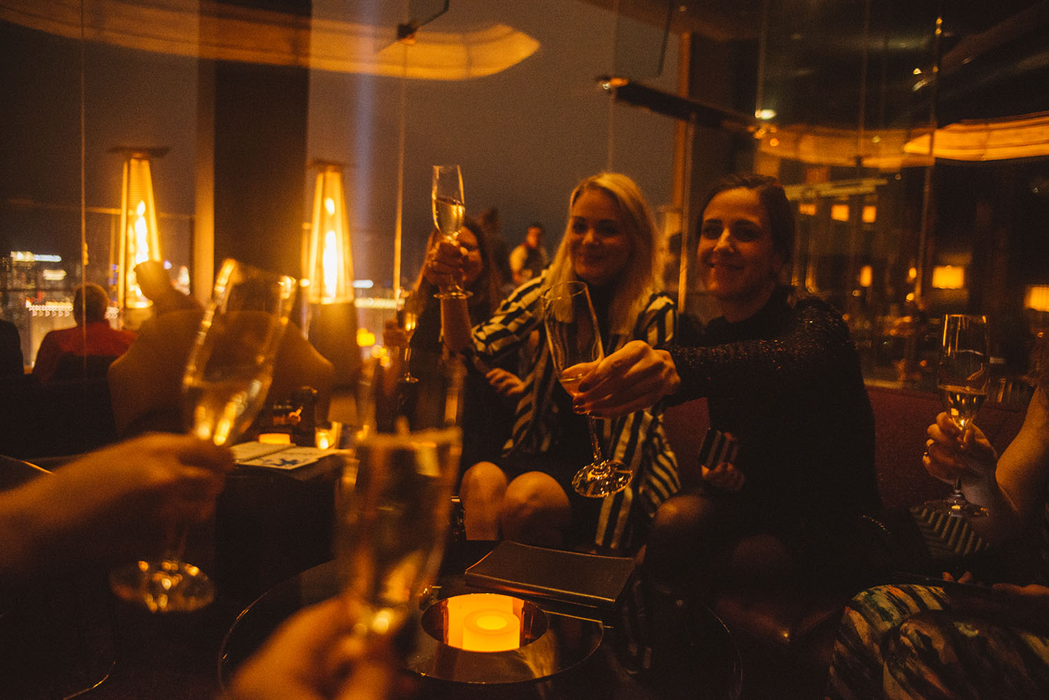 Women toasting in Skyfall Lounge at Delano