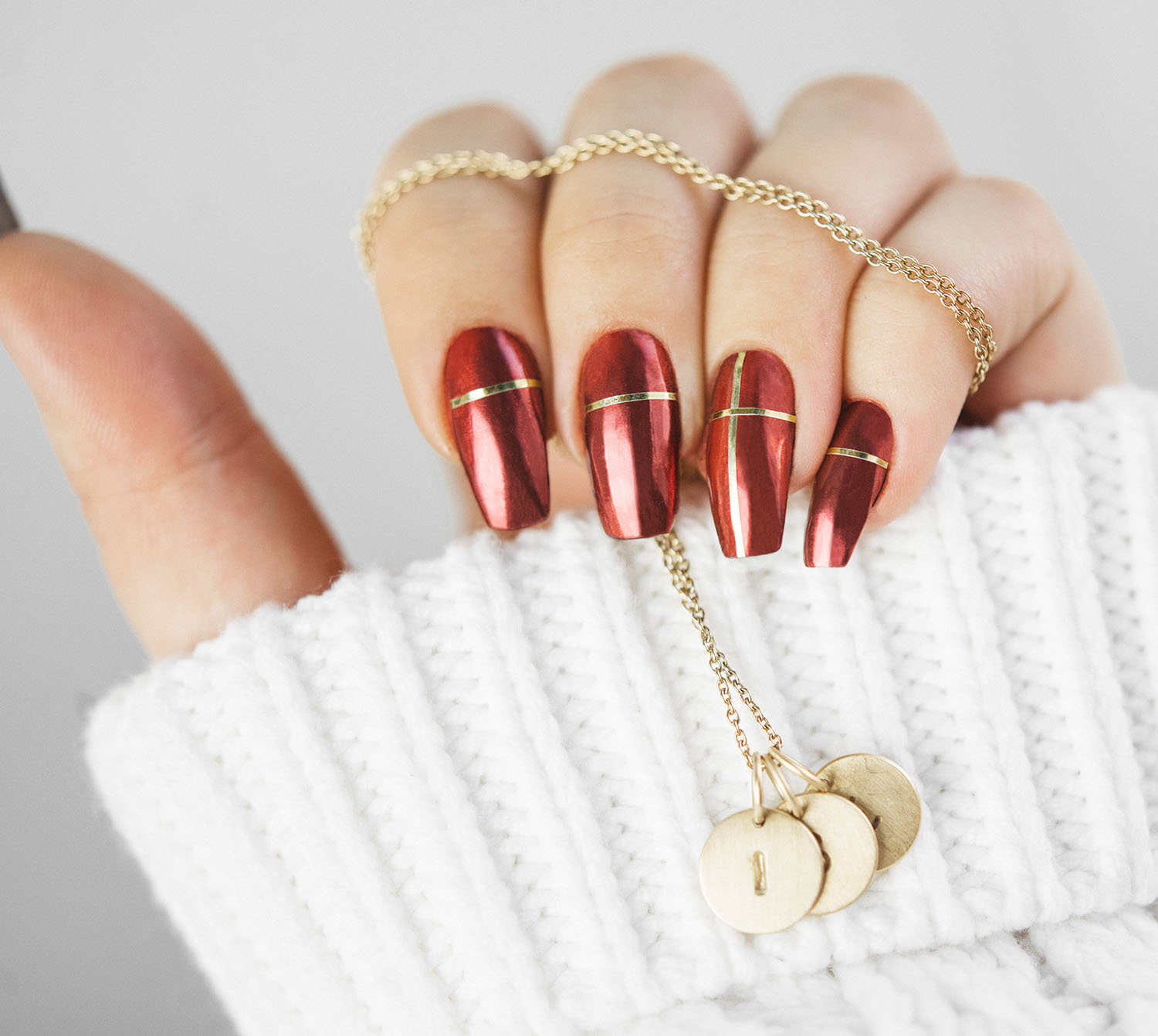 Red Lachrome Christmas Nails with Gold Striping Tape