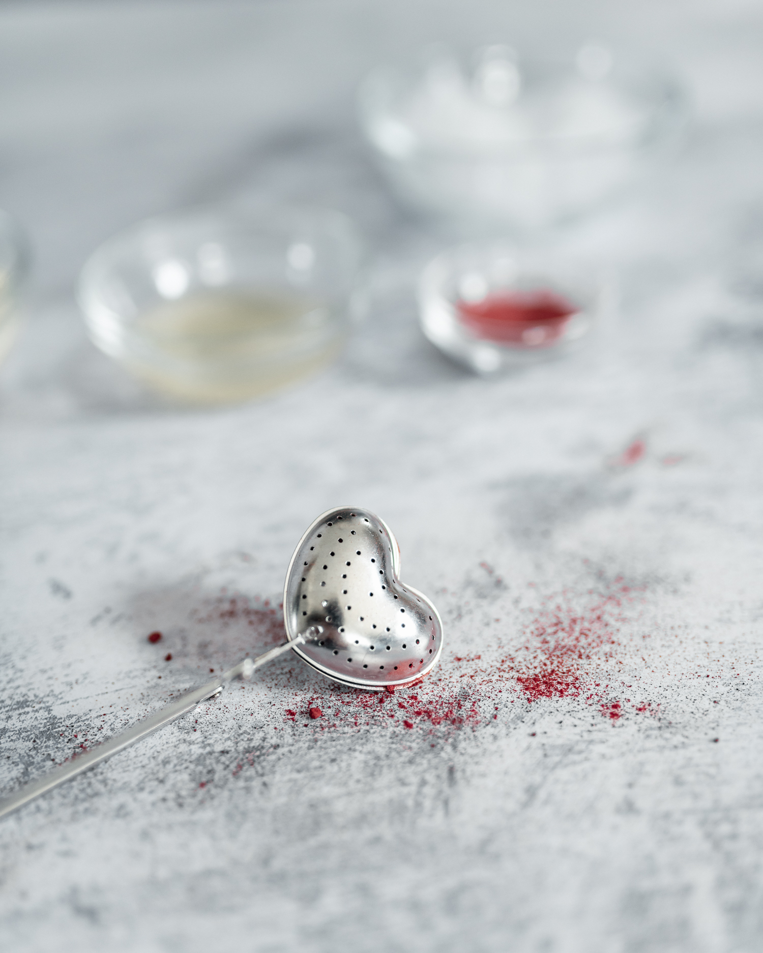 Beetroot powder in heart-shaped tea strainer